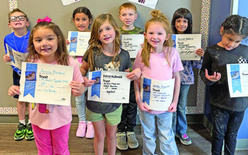 EIGHT FIRST-GRADE students at Caldwell Elementary School were recognized with Person of Value for Trust certificates.