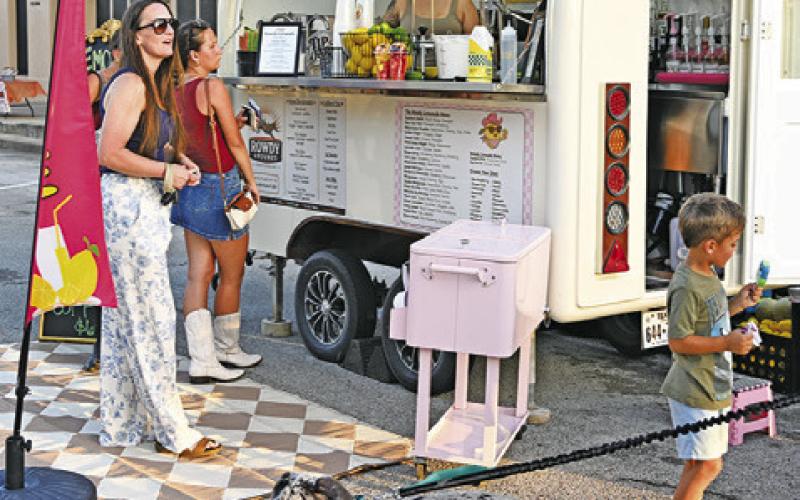 SEVERAL VENDORS WERE on site at Main Street Caldwell’s “Summer Concert Series” last Saturday night in downtown Caldwell. Tribune photo by Denise Squier