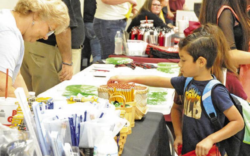 BURLESON COUNTY STUDENTS were able to get their school supplies for the upcoming 2024-2025 school year at Monday’s “Back-to-School Blast” at the Burleson County Expo Center. Tribune photo by Denise Squier