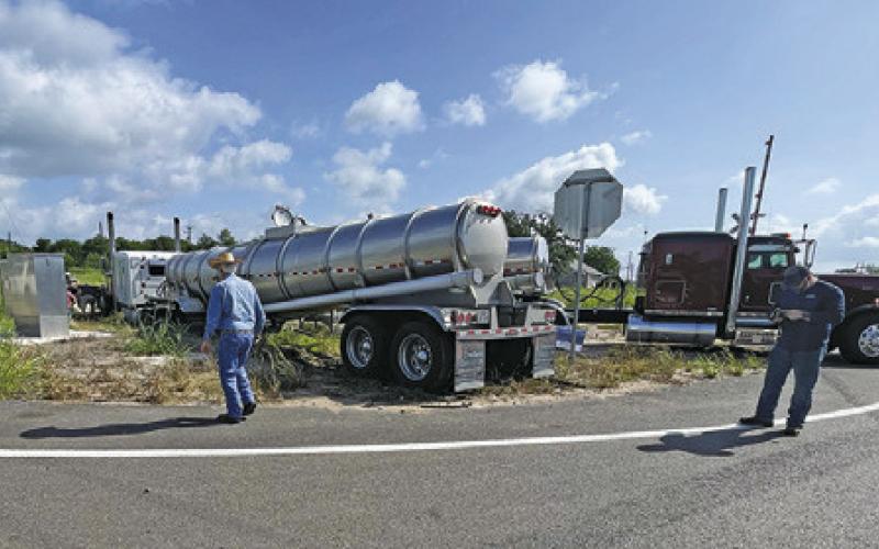 THIS 18-WHEELER goes off the road on July 16 at the F.M. 60 and State Highway 36 intersection.