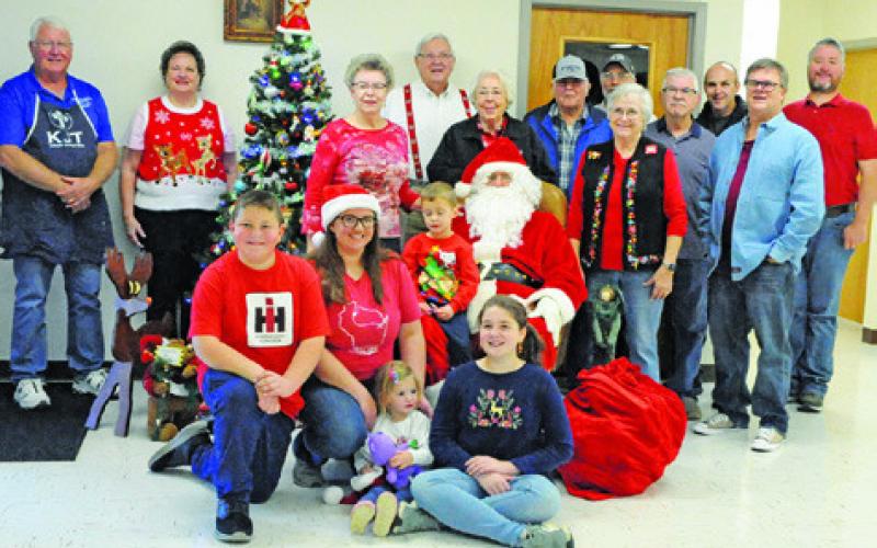 ST. BENEDICT KJT SOCIETY #100 sponsored “Breakfast with Santa” on Saturday, Dec. 4, at St. Mary Catholic Church’s Parish Activity Center, featuring a breakfast of pancakes and sausage and photo opportunities with Santa Claus. Tribune photo by Denise Squier
