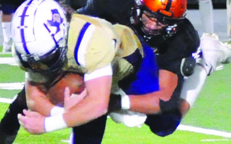 DECHRISTIAN DEERE makes a tackle for Somerville against D’Hanis last Friday. Tribune photo by Denise Squier