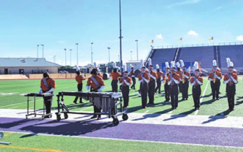 CALDWELL DRUM MAJOR Cierra Zamora directs the band during its performance at the USBands Liberty Hill Regional Contest last Saturday. The band qualified for the finals during Saturday’s competition.