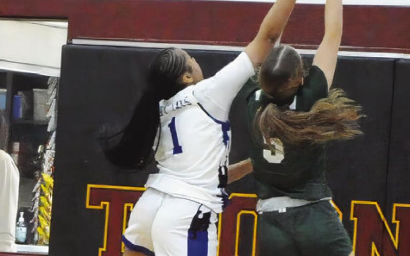 SNOOK’S ALANA STRINGFELLOW blocks a shot by a Valley Mills player during the Thorndale Shootout tournament last Friday. See inside for more about the Lady Jays playing in the tournament. Tribune photo by Denise Squier