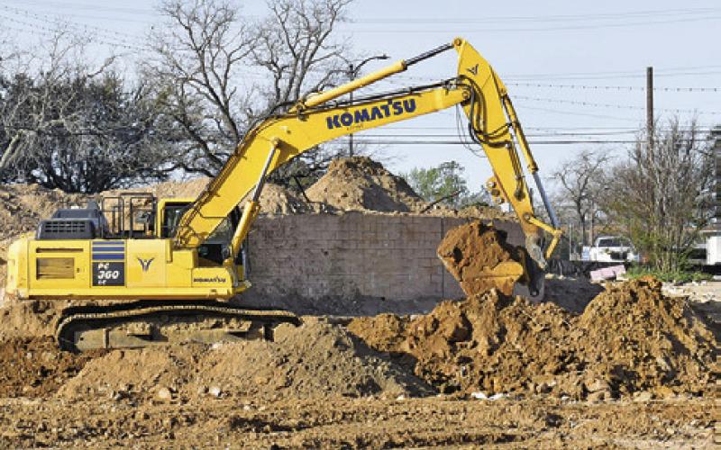 DIRT WORK CONTINUED on Monday, March 16, at the city hall construction demolition site in downtown Caldwell. The focus is now on the dirt work with the building completely demolished.