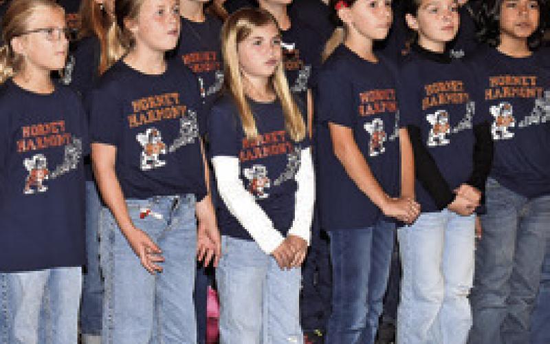 THE CALDWELL Intermediate School Choir performs at the Veterans Day ceremony.