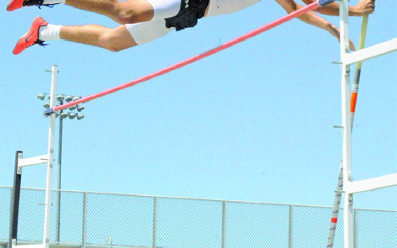 SNOOK’S BRETT WITHEM won the boys pole vault event at last week’s UIL 2A - District 25/26 Area Track &amp;amp; Field Meet. He cleared the pole at winning height of 11 feet 6 inches. -- Tribune photo by Denise Squier