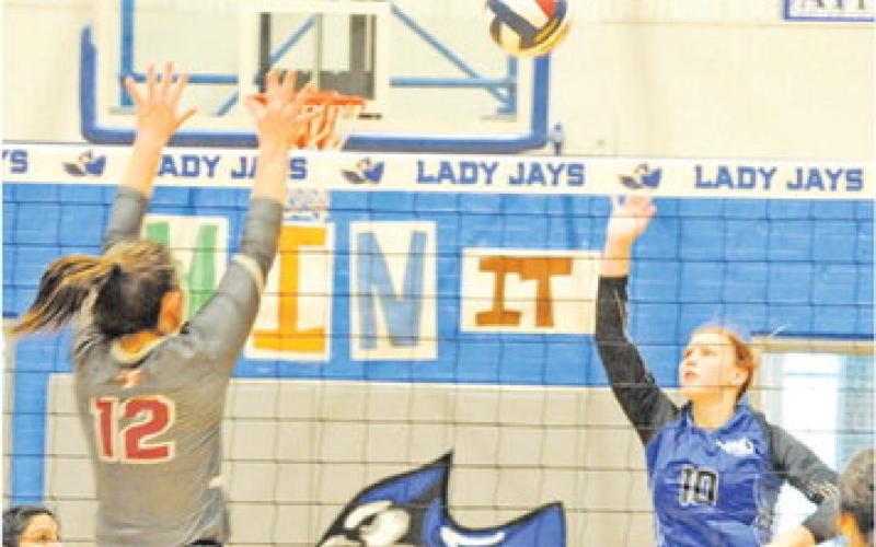 SNOOK’S PAYTON SODOLAK attempts to get the ball past Fayetteville’s Kayme Schley during the Snook-Fayetteville match last week.
