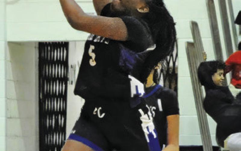 BRAYNIJA POOL flies to the hoop during the Snook-Somerville rivalry game last Tuesday. Tribune photo by Denise Squier
