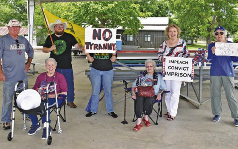 PROTESTERS ATTEND THE “No Kings” event in Caldwell.