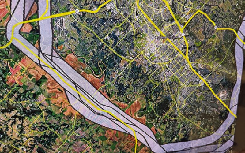 THE PORTION OF I-214 Loop is shown running from State Highway 21 East at the F.M. 50 intersection, top left, crossing F.M. 60 East, middle of the graphic and veering southward and then back east.