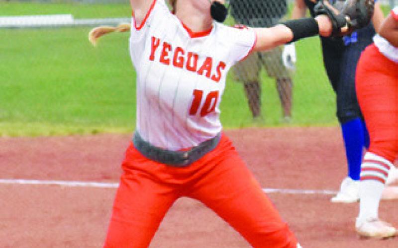 ABIGAIL FLENCHER pitches for the Lady Yeguas during the Somerville-Mumford game last week.