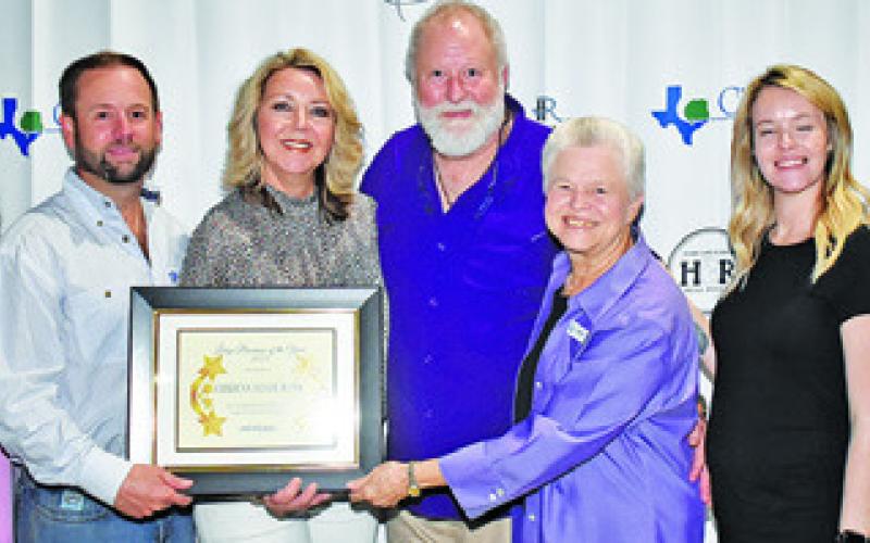 CITIZENS STATE BANK officials display their award for Large Business of the Year. They include, from left, Deborah Hildebrand, Cody Novosad, Raschel York, Scott York, Beverly Broaddus, Jacqueline Reese and Katie Gilbert. -- Tribune photo by Roy Sanders