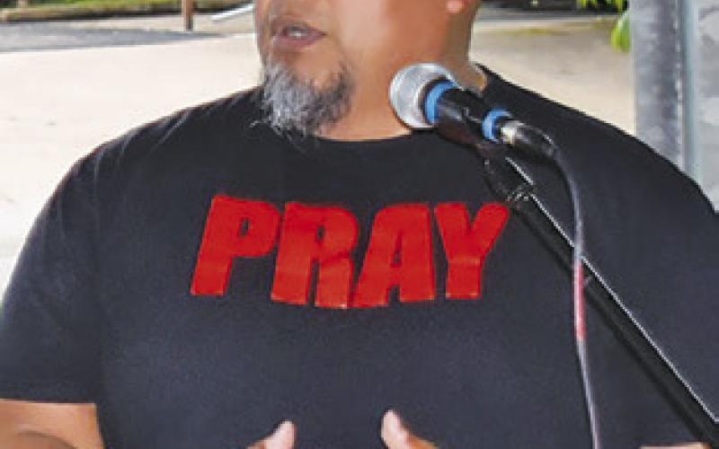 PASTOR JUAN Fraustro addresses the gathering during National Day of Prayer in Caldwell. -- Tribune photo by Roy Sanders