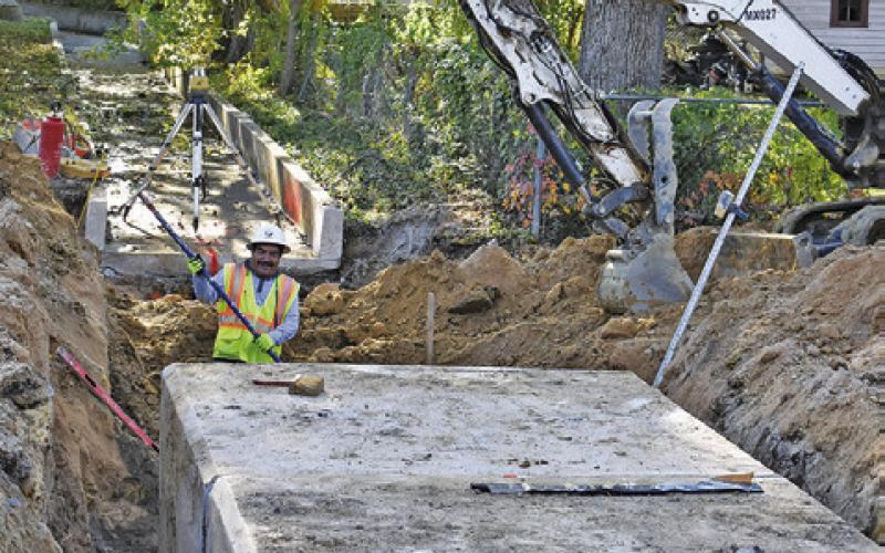 THESE LARGE box culverts are installed on Monday by construction crew workers on Harvey Street in Caldwell.