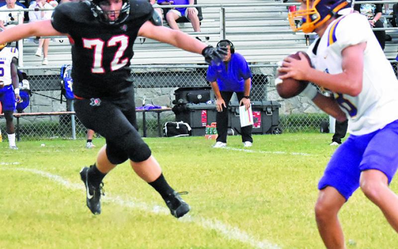 TREVOR ROSSER OF Somerville moves in for the tackle last Friday against Weimar Tribune photo by Roy Sanders