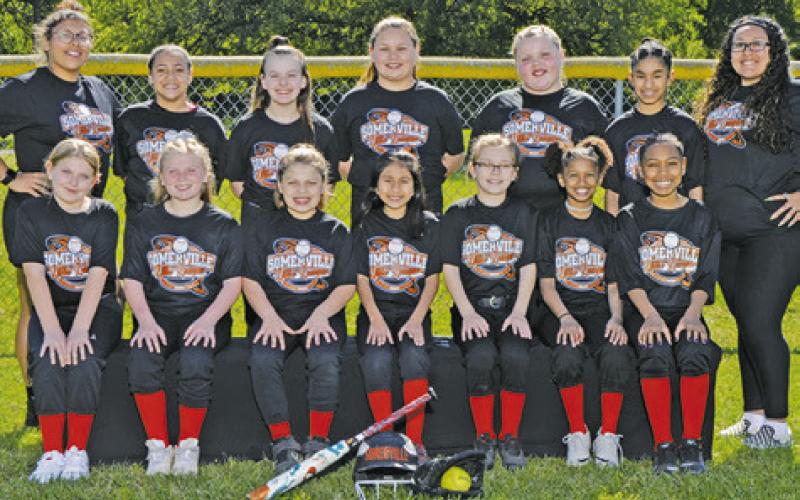 LADY YEGUA Abigail Flencher threw out the first pitch at the Somerville Little League Softball opening ceremonies.