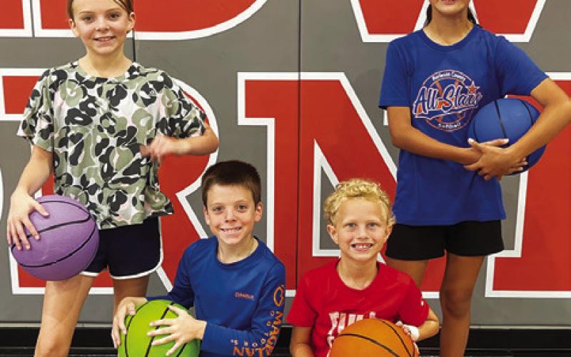 THE CALDWELL COACHING staff recently held its annual basketball camp for third through sixth-grade, and these athletes were selected as the camp’s MVPs and Hornet Award winners: Olivia Zamora, MVP; Ryan Story, MVP; Parker Pride, Hornet Award; Porter Pride, Hornet Award.