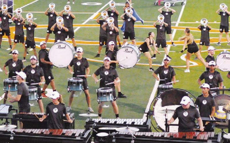 GENESIS, A CORPS THAT IS PART OF Drum Corps International, performed for the public at Hornet Field on Saturday. The corps held practices in Caldwell over the past few weeks, preparing for its summer DCI competition.