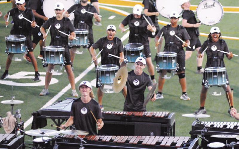 GENESIS’ DRUM LINE AND pit crew were excited about the music at Saturday’s performance in Caldwell. -- Tribune photo by Denise Squier