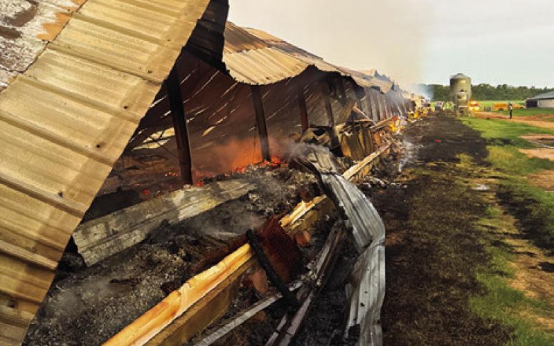 THIS HEN FARM house is damaged by fire in the early Thursday, June 6, blaze off County Road 112 near Deanville.