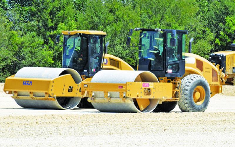 LCRA CREW MEMBERS continue dirt work at what will be the new City of Caldwell substation site on Galilee Street. Tribune photo by Roy Sanders