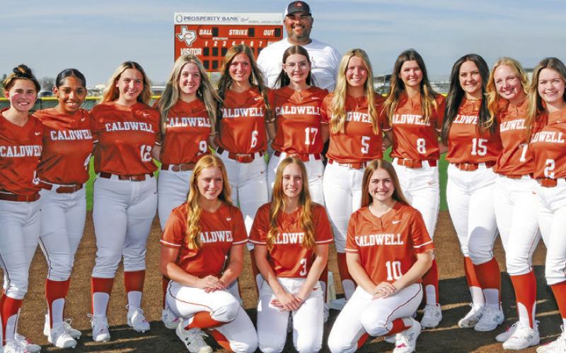 THE 2024 CALDWELL HIGH SCHOOL VARSITY LADY HORNET SOFTBALL TEAM is, from left, front, Caitlyn Faust, Avery Smith, Kelly Urbanovsky, middle, Coach Delaney Loosemore, Breann Sims, Avelynn O’Riley, Kaylee Crump, Molly Meadows, Kysen Toney, Larisa Foster, Hadleigh Novosad, Jillian Vykukal, Callie Fletcher, Mia Witherwax, Kameryn Hill, Coach Wendy Weiss, back, and Coach Marcus Escalante. Photo courtesy of Dianne Pursch Photography