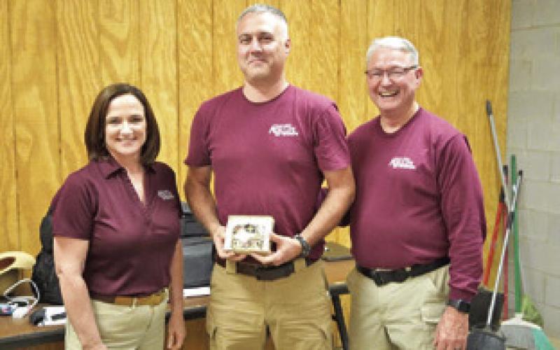 KEVIN HOEGENAUER WAS one of two Texas A&amp;amp;M AgriLife Extension Service Disaster Assessment and Recovery agents who received the inaugural Andy Vestal Award for Excellence. Also receiving the award was Matthew Rodriguez. Hoegenauer (center) was presented the award by Angela Burkham, Ph.D., AgriLife Extension associate director, and Monty Dozier, Ph.D., DAR program director. Photo courtesy of Blair Fannin/Texas A&amp;amp;M AgriLife