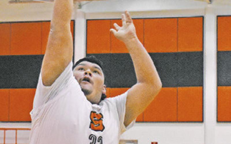 JESUS ESPINOZA takes a shot against Mumford last Friday in Somerville.