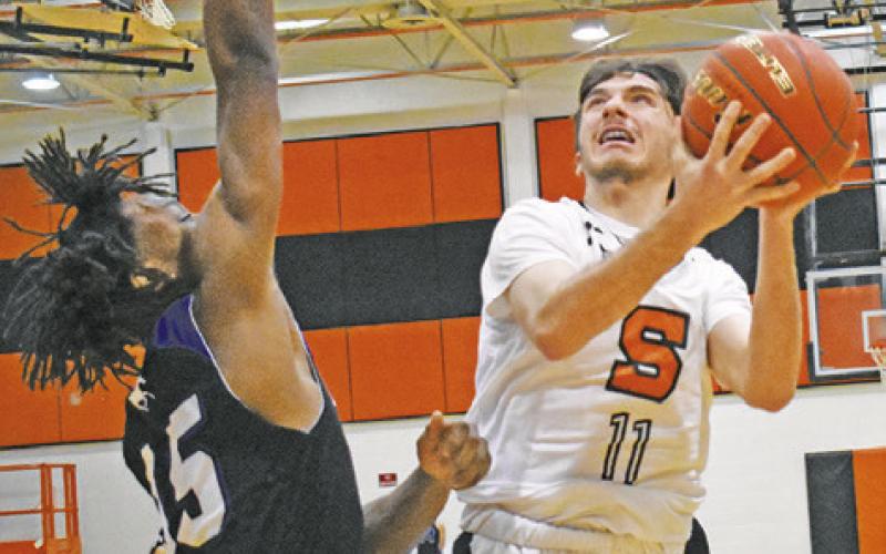 SOMERVILLE’S KASON ROHRBACH takes a shot against Mumford in the Yeguas Friday loss in Somerville. Tribune photo by Roy Sanders