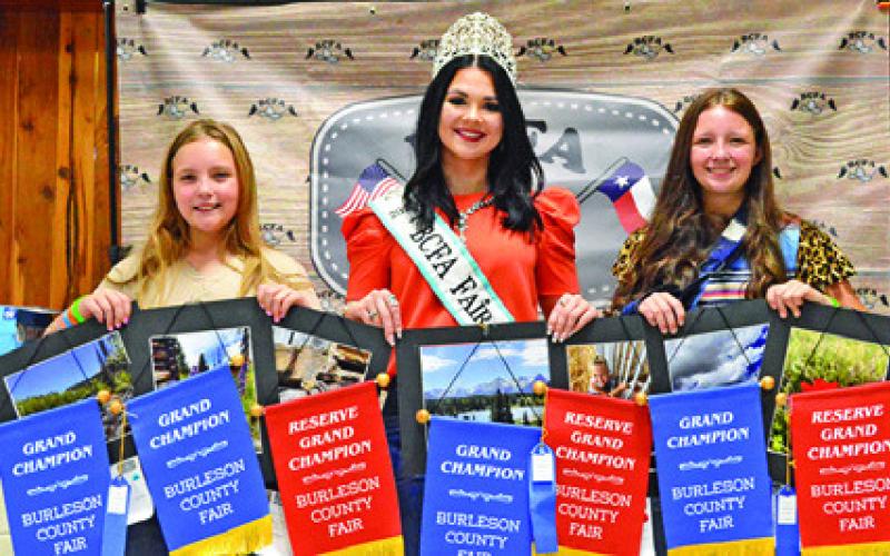 HEIDI AND HATTIE HERMANN WON grands in Junior Photography and Creative Arts. They are pictured with Fair Queen Kodi Hitchcock. Tribune photo by Sabine Lazo