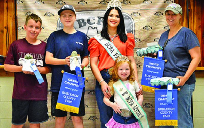 COLTON SEARS WON GRAND in horticulture. Haley Sears (not pictured) won two grands in horticulture. Also pictured are Fair Queen Kodi Hitchcock and Little Miss Taytum Hohlt. Tribune photo by Sabine Lazo