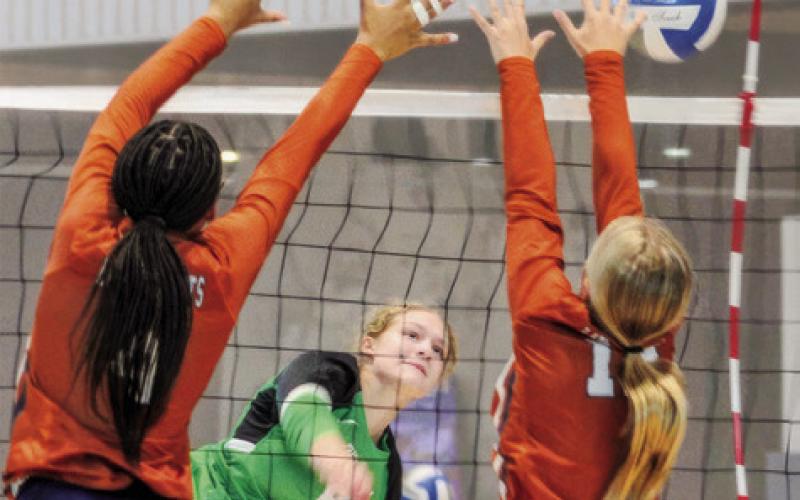 THE LADY HORNETS PLAYED in the Legends Invitational Volleyball Tournament last week. They are pictured playing against Brenham. Photo courtesy of Legends Event Center