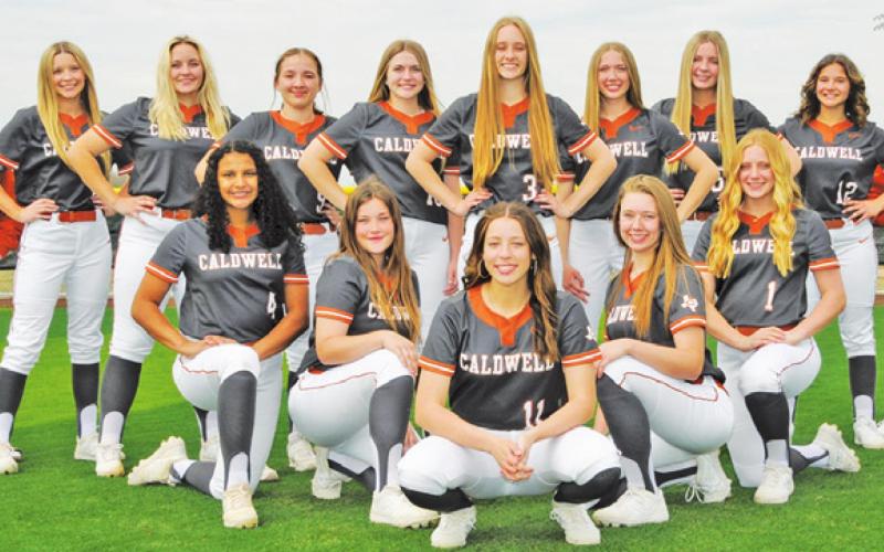 THE 2022 CALDWELL LADY HORNET VARSITY softball team is, from left, standing, Breann Sims, Brianna Salem, Callie Fletcher, Trista Dusterhoft, Kelly Urbanovsky, Avery Smith, Tilly Hicks, Hadleigh Novosad, Bree Taylor, Alyssa Schenk, kneeling, Aliyah Vela, Stephanie Brackman, Kyleigh Gomez, Tess Homeyer and Caitlyn Faust. --Photo courtesy of Dianne Pursch Photography