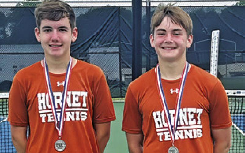 PARKER WHITE and Billy Cochran placed second in boys doubles at the District 22-4A Tournament last week in Caldwell and qualified for the regional tournament.
