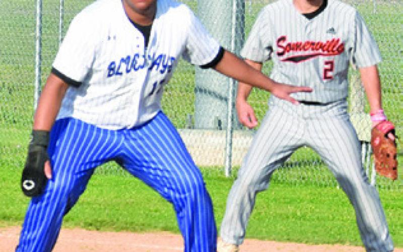 SNOOK’S RAMIRO MARTINEZ takes a lead off first base while Somerville’s Colt Holton tries to be ready for him to attempt a steal. Tribune photo by Roy Sanders