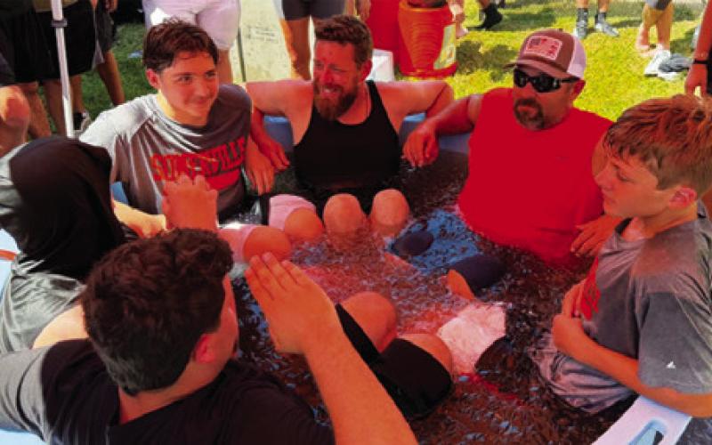 YEGUAS AND THEIR DADS participated in the second annual Cold Daddy Day with ice baths.