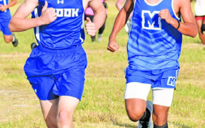 ETHAN JANAC WON THE boys’ varsity title at last week’s District 26-2A Cross Country Meet at the Snook City Park.