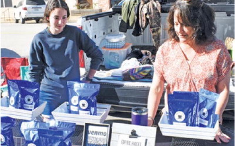 JULIE AND TANNA Boykin work at the Jay’s Java stand on Saturday morning at the Farmers Market in downtown Caldwell.