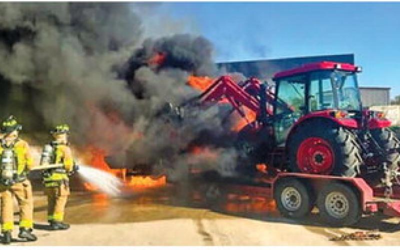 SNOOK AND CALDWELL volunteer firefighters respond to this truck fire on Monday at the store parking lot at State Highway 21 and F.M. 50. Photo courtesy of Snook Volunteer Fire Department