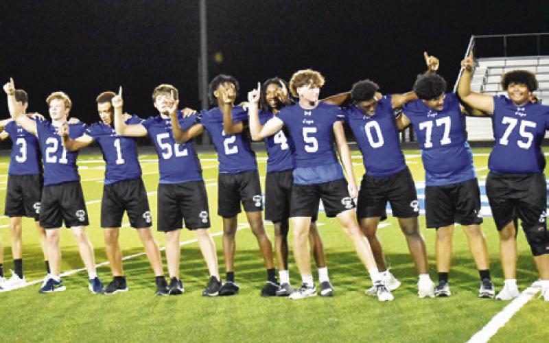 SNOOK HIGH SCHOOL football players enjoy the Meet the Bluejays celebration on Friday night.