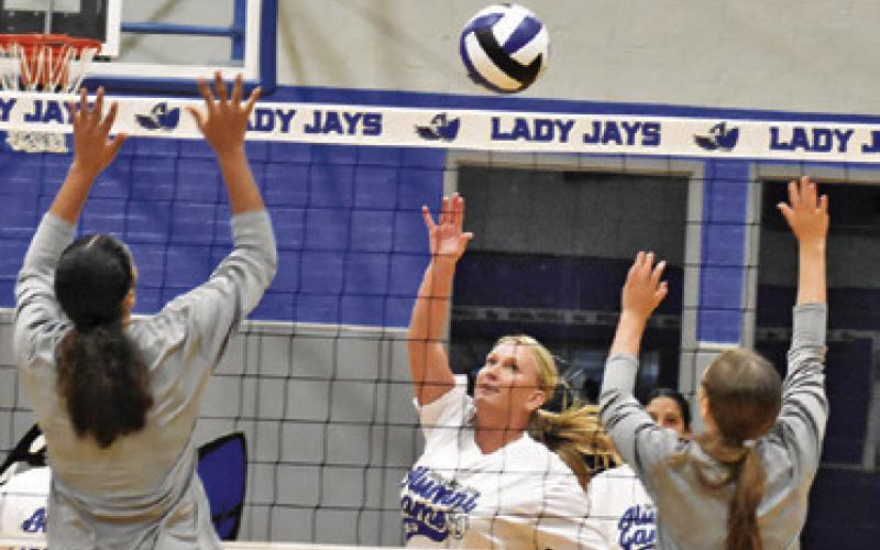 THE SNOOK VOLLEYBALL ALUMNI played valiantly against the current Lady Jays during Friday night’s alumni game. Tribune photo by Roy Sanders