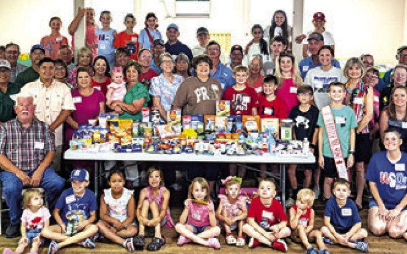 SPJST MEMBERS GATHER at the District 1 Rally to raise money and food donations for local food donation spots. Photo courtesy of Autumn Baker