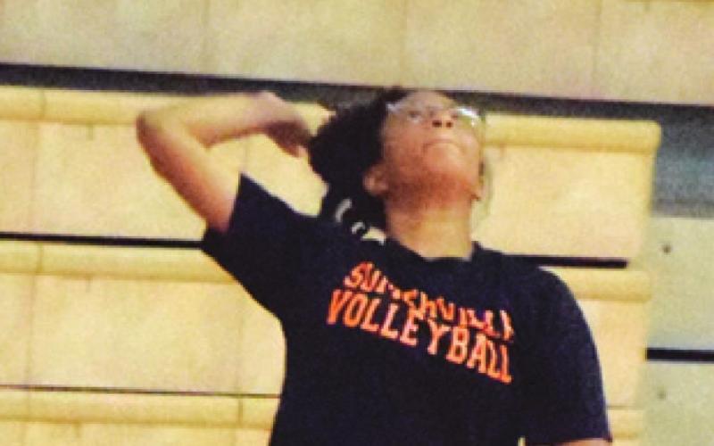 ALAZIA VELA prepares to serve the ball during a Lady Yegua practice last week at the high school. -- Tribune photo by Denise Squier
