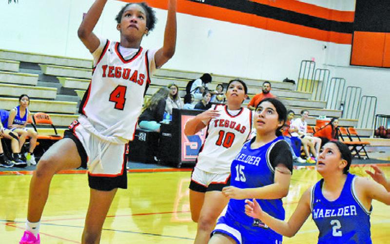 SOMERVILLE’S KARYS ELLIS shoots a layup during the Lady Yeguas’ tournament win over Waelder last week in Somerville. Tribune photo by Roy Sanders