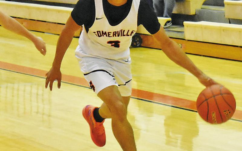 DAWUD MAJIED OF Somerville dribbles the ball in the Yeguas game against Bellville Faith Academy. -- Tribune photo by Roy Sanders