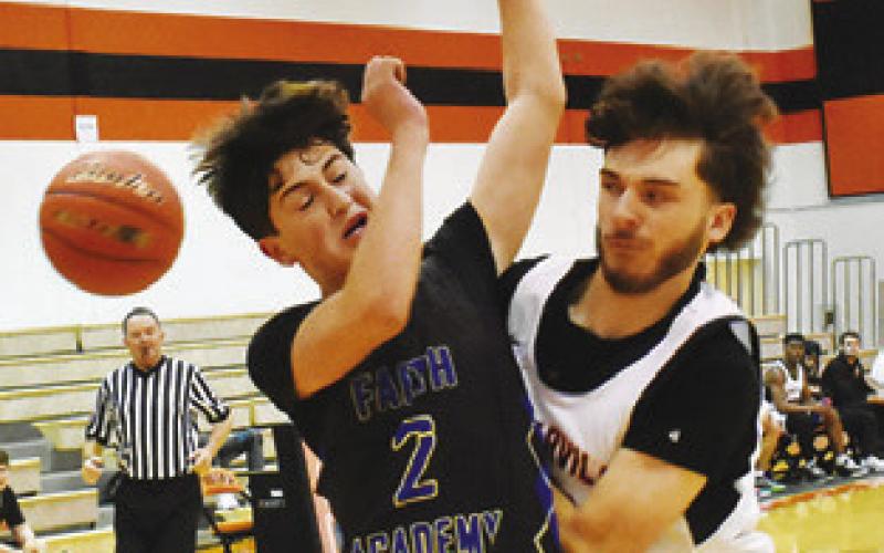 SOMERVILLE’S KASON Rohrbach plays defense against Bellville Faith Academy.