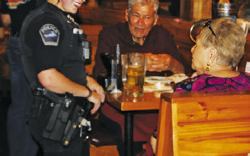 SOMERVILLE POLICE Officer Lindsey Kindt recently participated in “Tip-a-Cop” at Texas Roadhouse in College Station to raise money for Special Olympics.