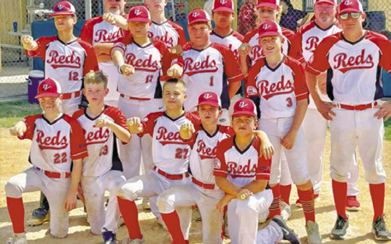 THE DEANVILLE REDS 14U Pony League baseball team recently competed in the Zone Tournament in Youngsville, Louisiana. The team is pictured after winning the Section Tournament title in June.