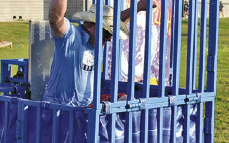 THE DUNKING Booth was a popular attraction on Aug. 4 for the Burleson County Sheriff’s National Night Out event.